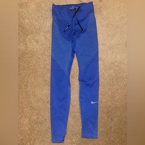 Nike blue leggings with detailing